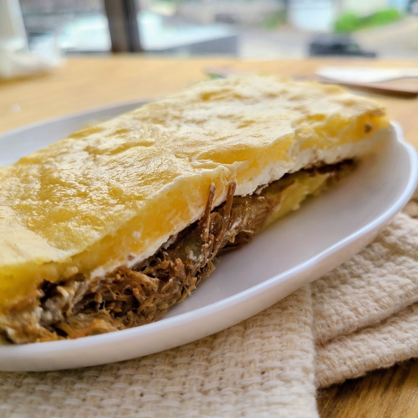 Cassava Puree with Meat and Cottage Cheese “Família”